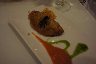 empanadilla de txipiron en su tinta