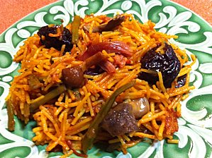 Receta de fideuá de pato con boletus.