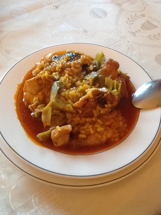 Receta de cocina: Arroz caldoso con pollo.