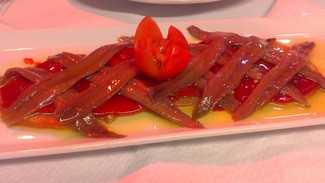 Antxoas con pimientos