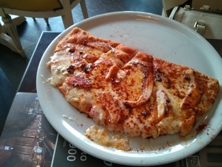 Pizza de pulpo con tetilla