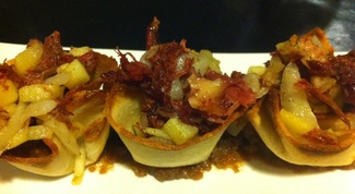 Saquitos de Pato, Cebolla Caramelizada y Manzana