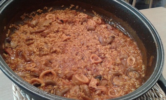 Arroz de Salchichas, Setas y Calamares del Restaurant l'Alqueria de Girona