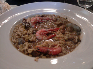 Arroz meloso con gambitas de Palamós, sepia y almejas