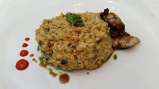 Arroz cremoso de hongos y codorniz
