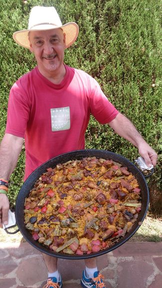 El cocinero y la paella