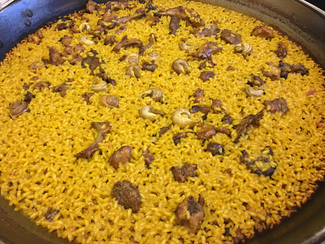 Arroz con conejo y caracoles