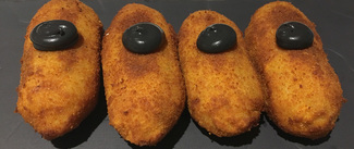 Croquetón de chipirones en su tinta