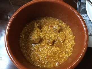 Arroz caldoso de conejo