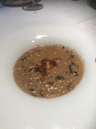 Arroz meloso con setas, contundente.