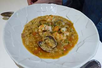 Arroz meloso de langostinos del Delta del Ebro, sepia, calamar y almejas