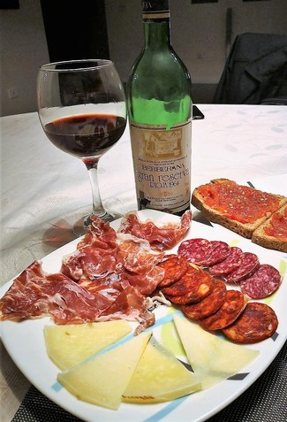 Con los ibéricos y el queso