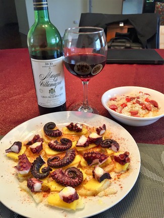 Con el pulpo a feira y mango