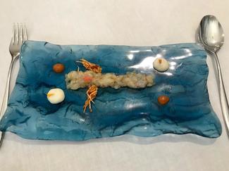 Langostino, coliflor, pomelo y crema de sus cabezas.