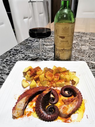 Con el pulpo a la brasa