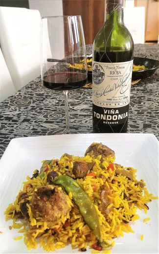 Con el arrocito de mollejas y pilotes