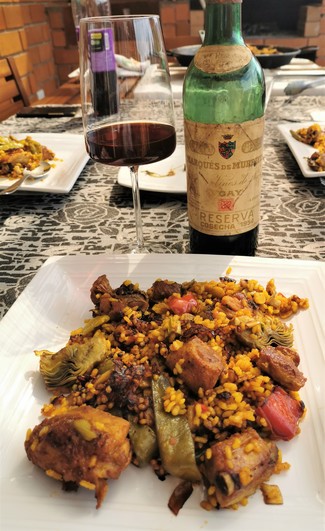 Con la paella de leña