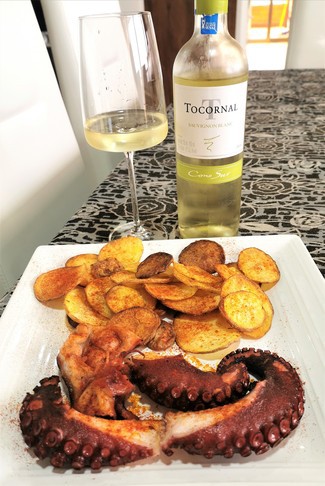 Con el pulpo a la plancha