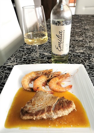 Con unos langostinos plancha con albacora en salsa de mango y jengibre.