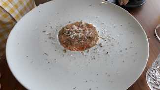 Carpaccio de gambas y zamburiñas con pil pil de ajillo