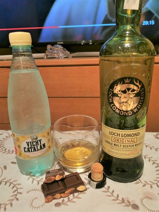 Con el chocolate y el agüita con gas