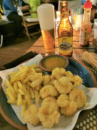 Con los camarones rebozados