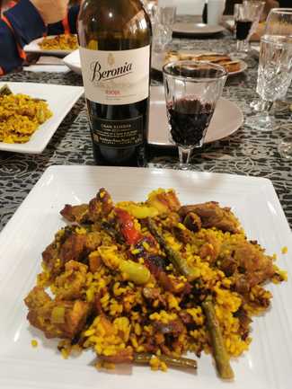 Con el arrocito de mollejas, pollo y costilla
