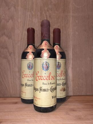 Vendo lote de botellas de vinos antiguos de Rioja.