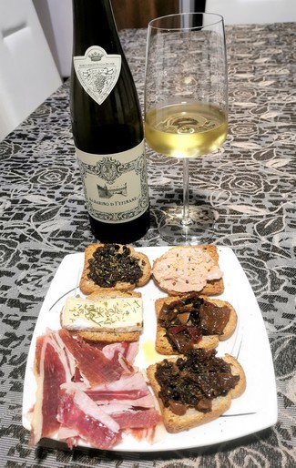 Con la paletilla ibérica y las tostas