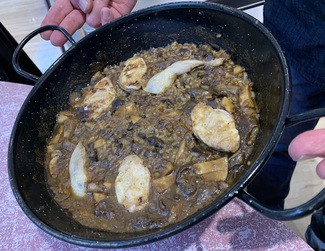 Arroz meloso de setas y codorniz