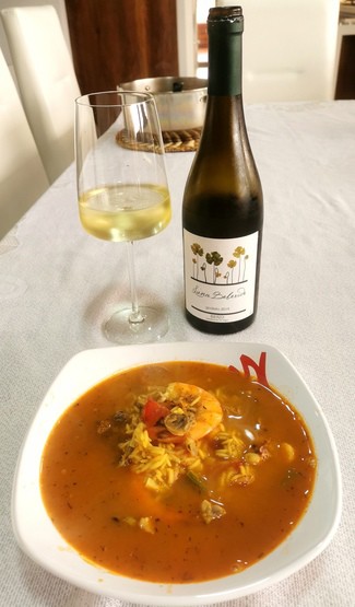 Con el arroz caldoso