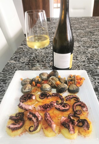 Con el pulpo a feira y las almejas