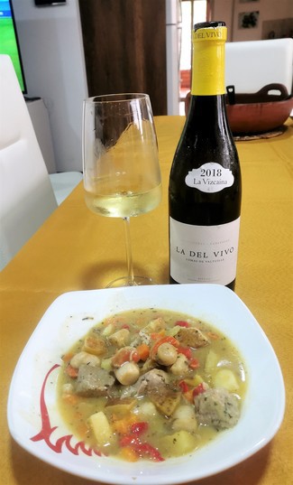 Con el suquet de albacora, vieiras y guanábana