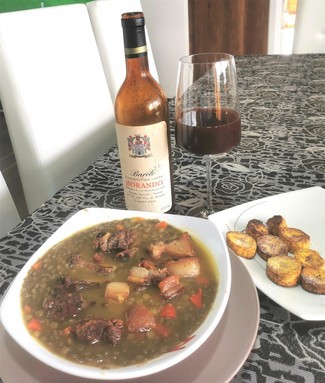 Con las lentejas con morro y costilla