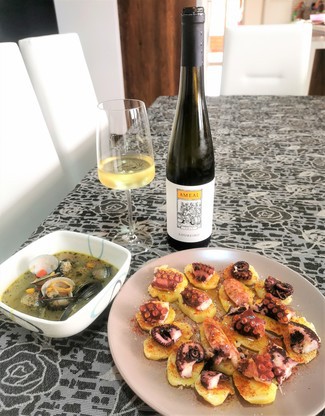 Con el pulpo a feira y las almejas