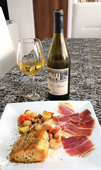 Con el wahoo con vieiras y jamón