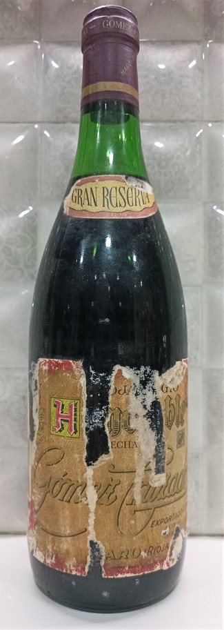 Botella algo deteriorada