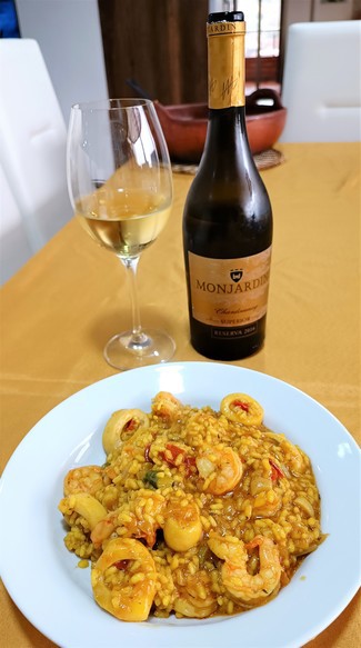 Con el meloso de camarones y calamares