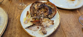 Cabeza del Cabracho asado a la brasa de enzina
