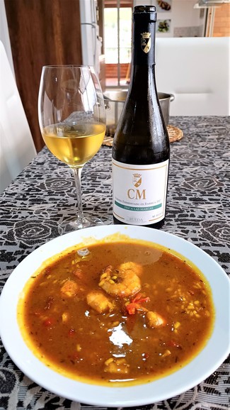 Con el caldoso de calamares y langostinos