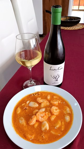 Con el suquet de chipirones y camarones