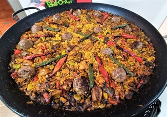 Arroz de leña, de manitas y pilotes