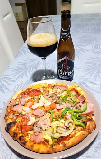 Con la deliciosa pizza