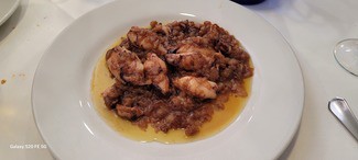 Chipirones encebollados