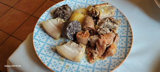 compango (morcilla, tocino, chorizo y carne)