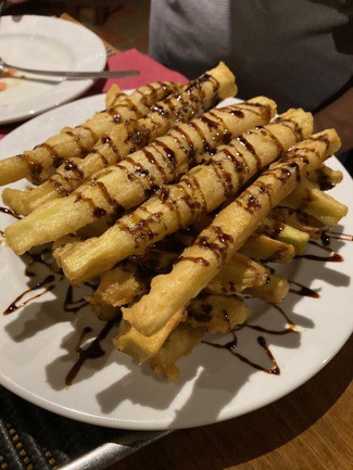 Berenjenas en tempura con miel.