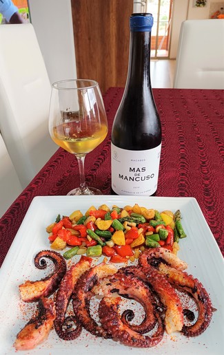 Con el pulpo a la plancha