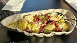 Alcachofas confitadas con jamón