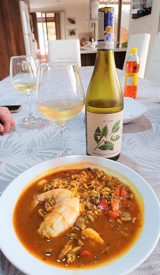 Con un arroz caldosito de langostinos