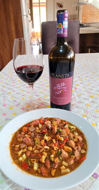 Con las alubias pintas con pernil
